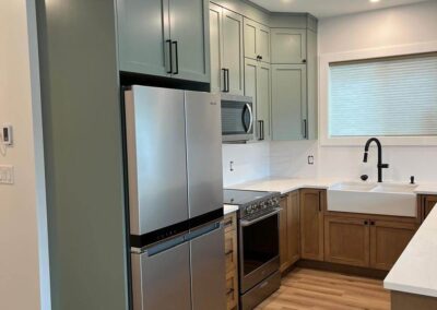 Green Cabinets above Wood below-Kamloops Kitchen Studio